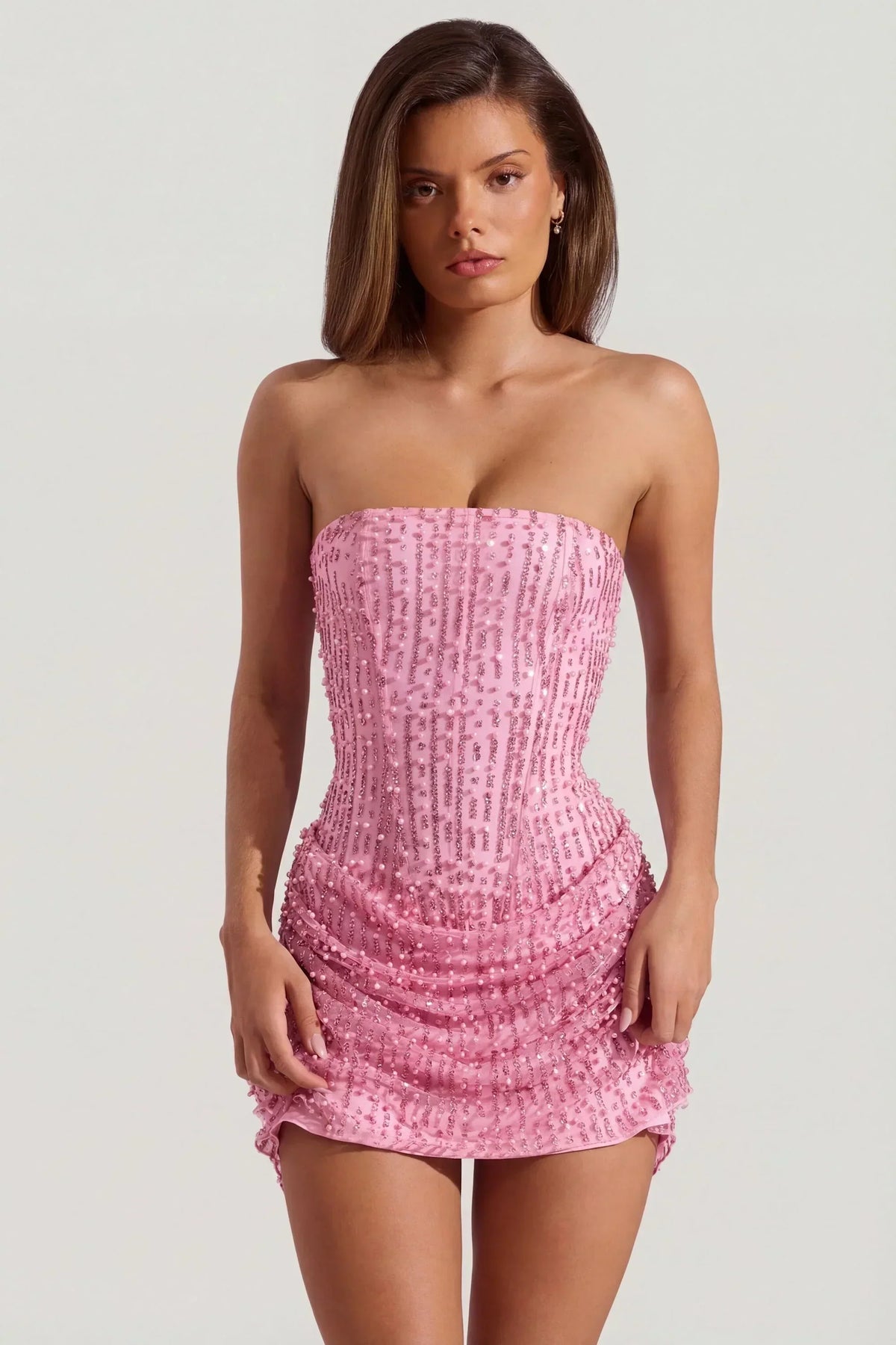Mini-robe trapèze bustier ornée drapée rose