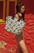 syclos Large SIGNATURE printed trapeze bag