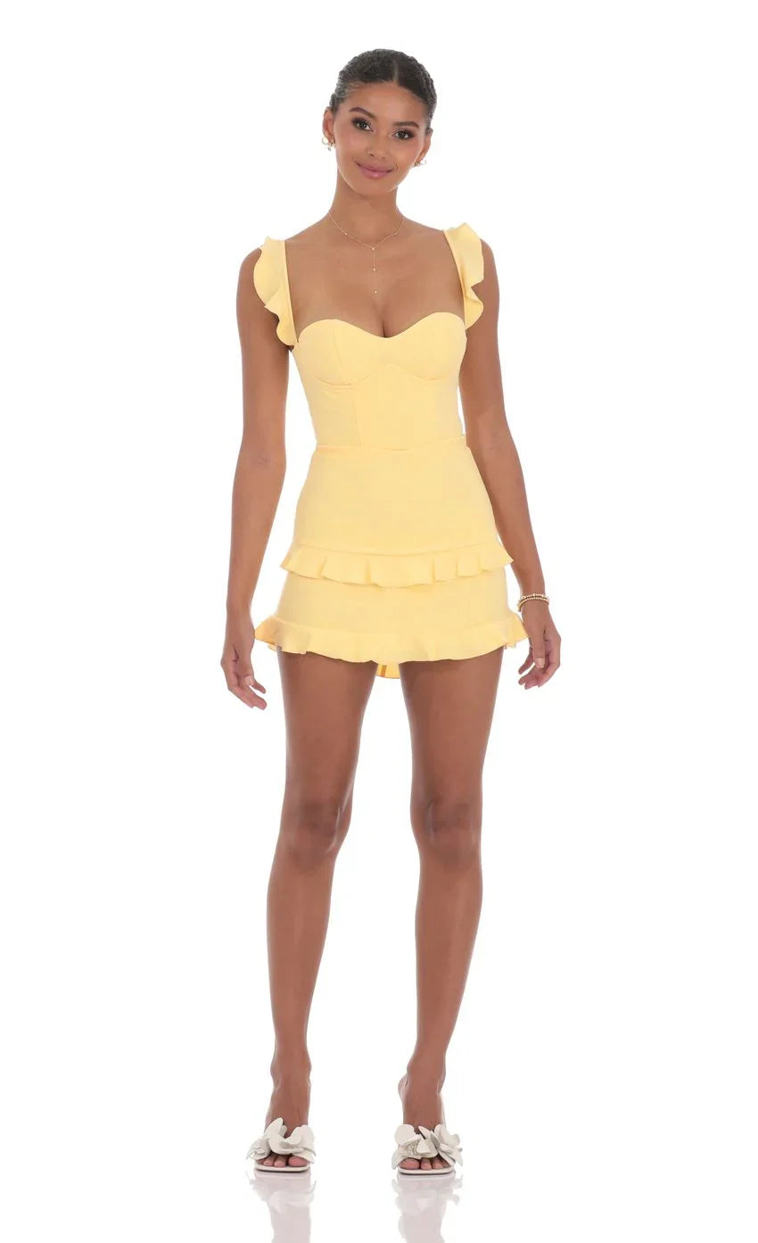 Robe moulante à volants jaune