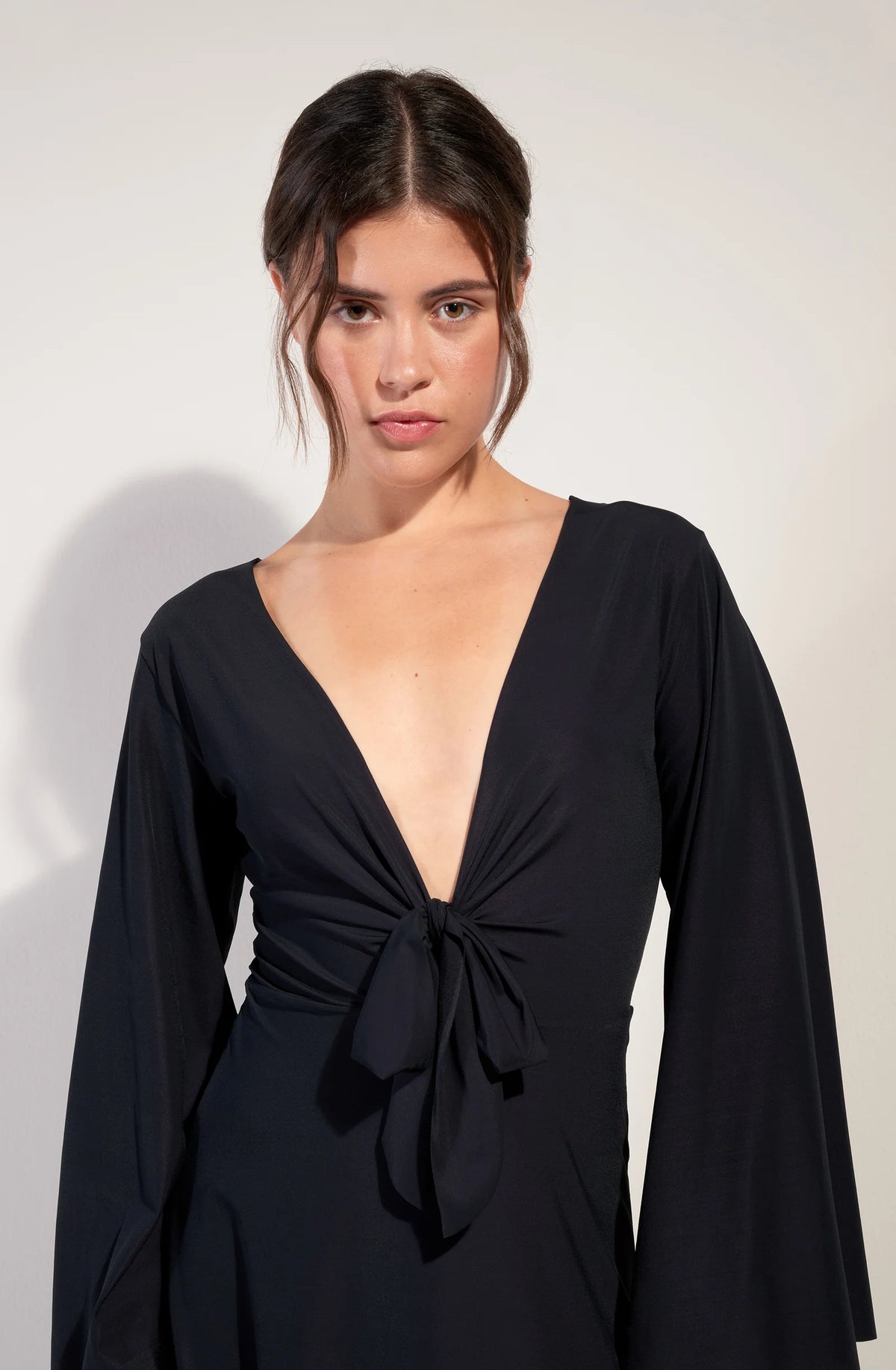 corey Short black dress with long sleeves