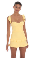 Robe moulante à volants jaune