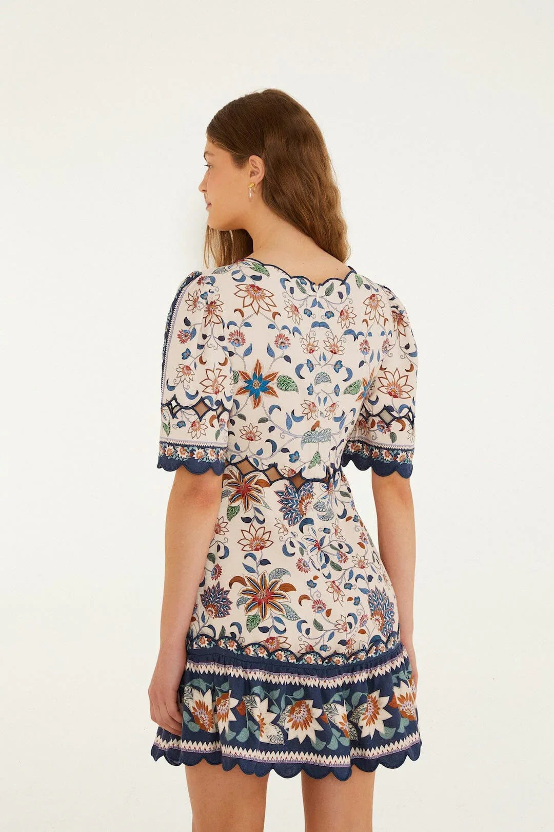 Mini-robe à découpes festonnées en tapisserie florale rose Delhi
