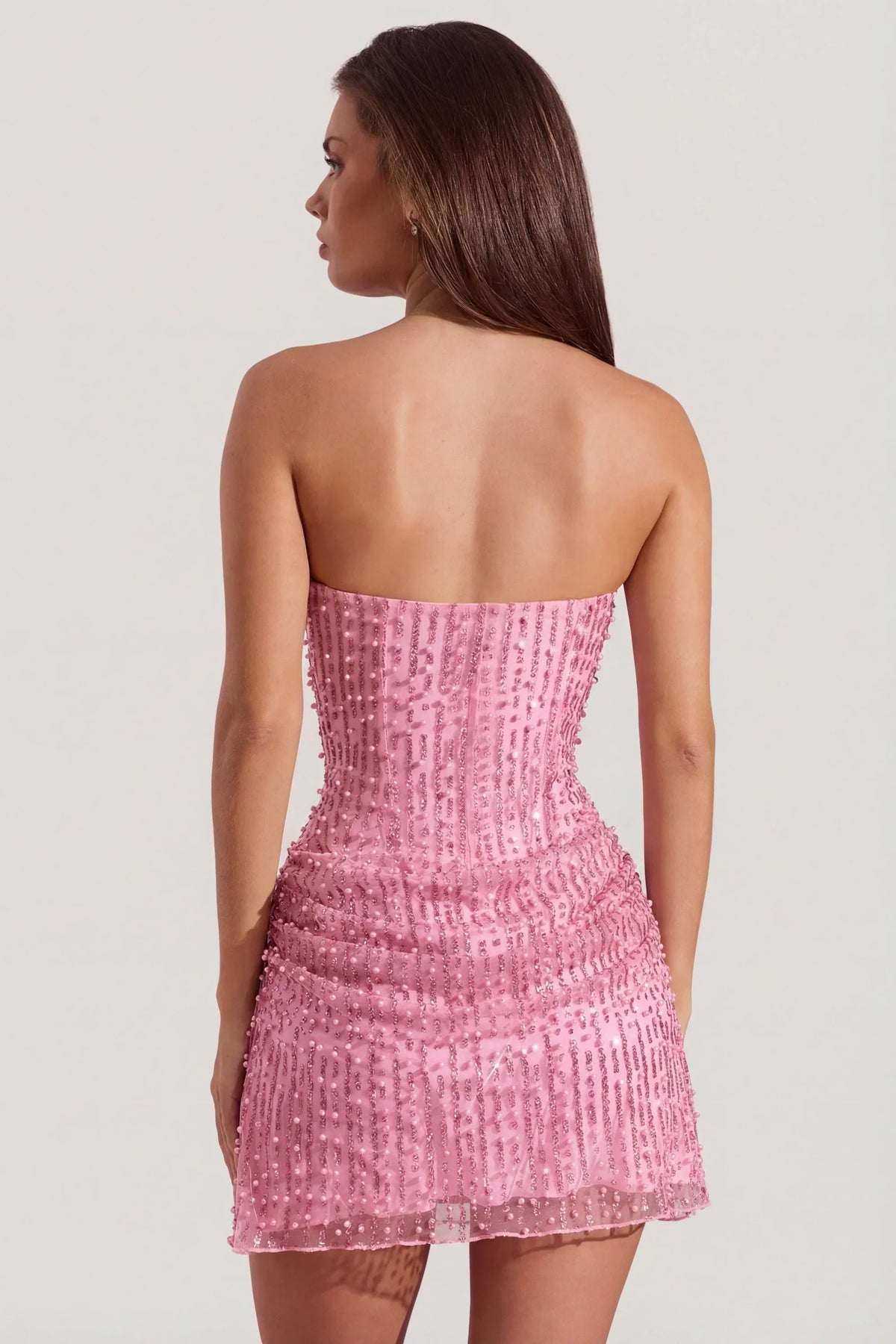 Mini-robe trapèze bustier ornée drapée rose