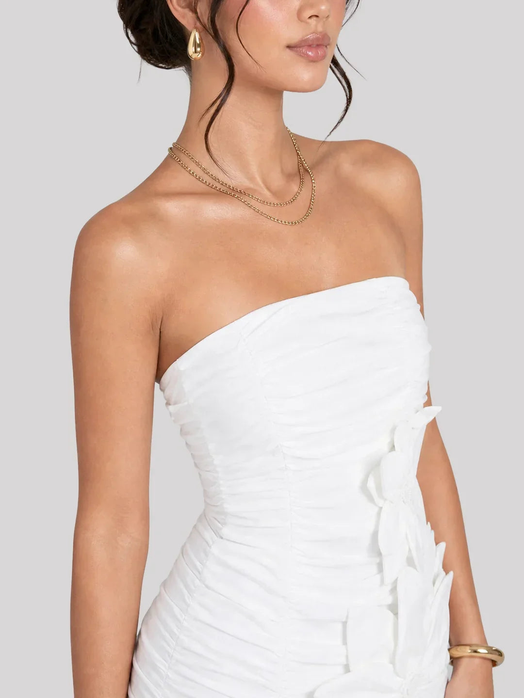 Mini-robe bustier à appliqués floraux 3D