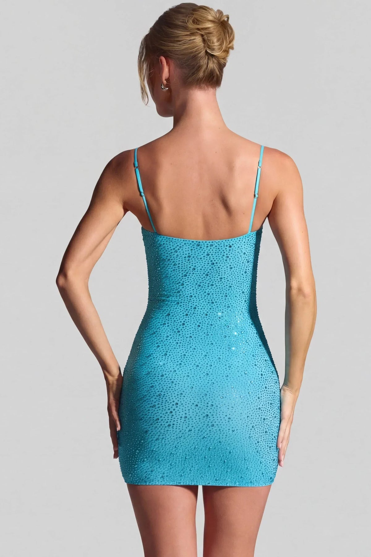 Mini-robe moulante ornée bleu sarcelle